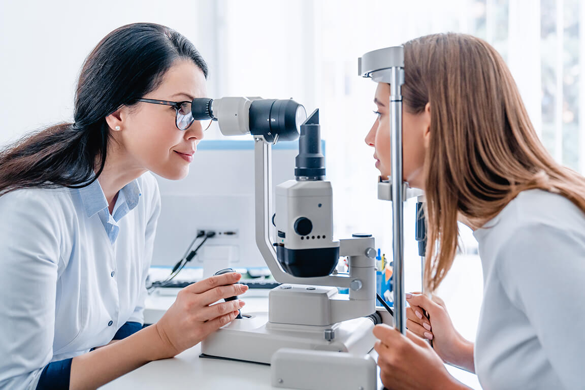 A patient getting an eye exam at an optical clinic